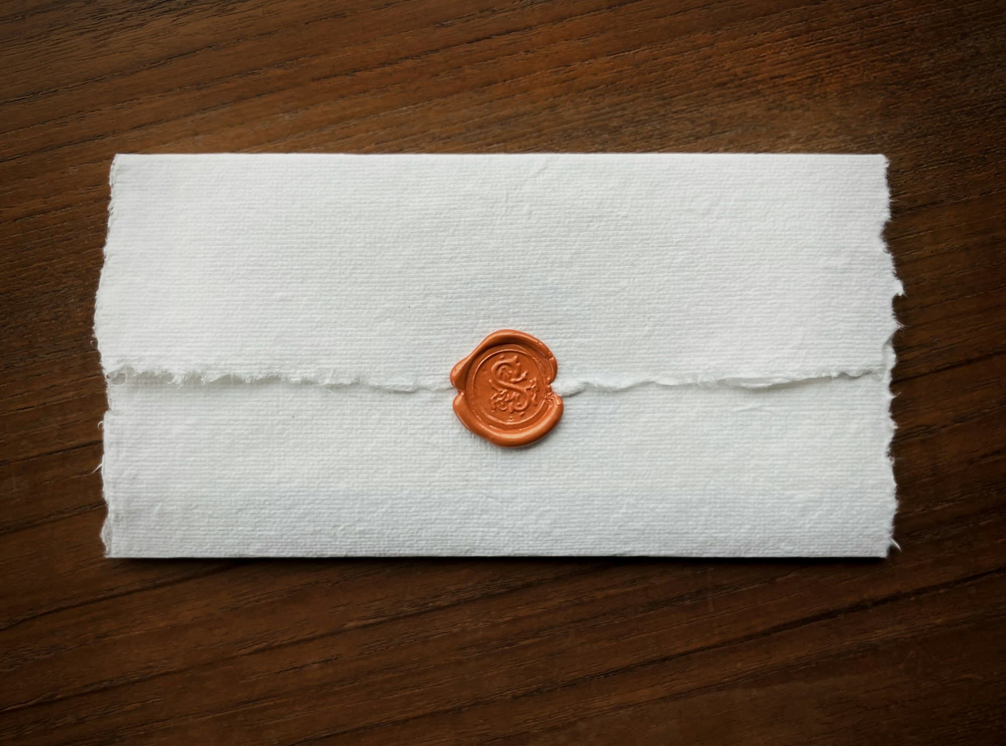 A wax seal pressed onto paper.